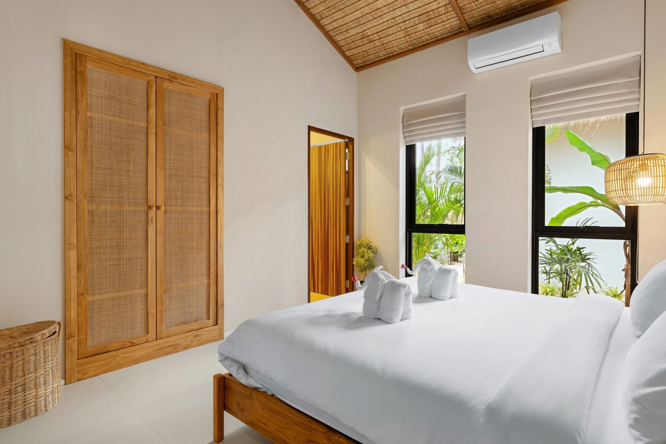 Standard hotel room with king-size bed and bright modern interior